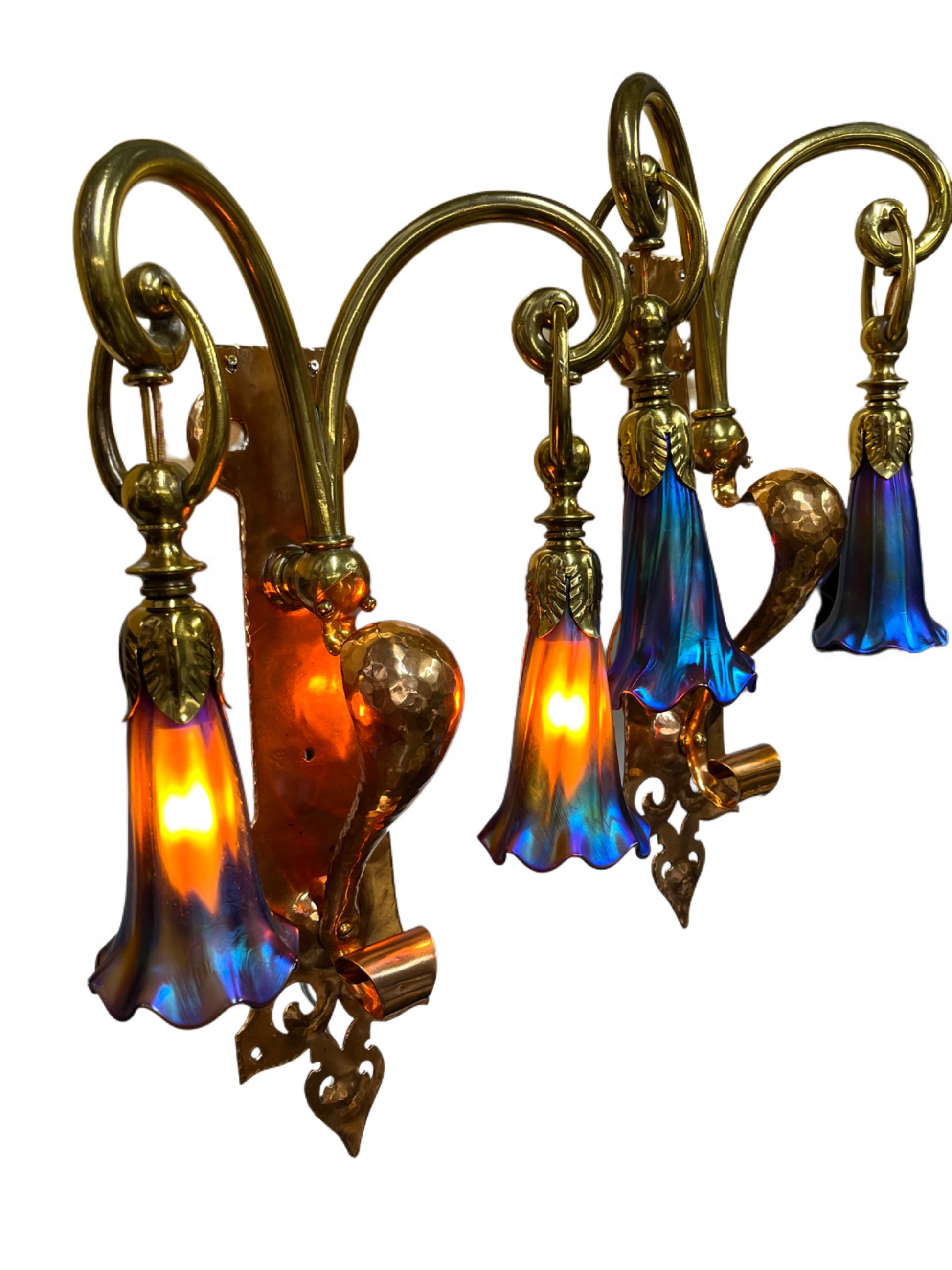 Side view oof nouveau sconces in manner of WAS Benson art glass shades